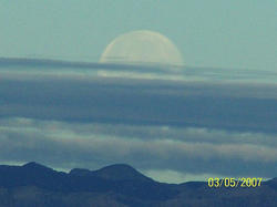 /images/moon_in_the_clouds_250x187.jpg
